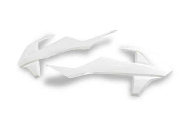 Radiátor UFO pokrývá bílý plyn MC 85 GG07114@041